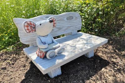 Mouse sat on a bench