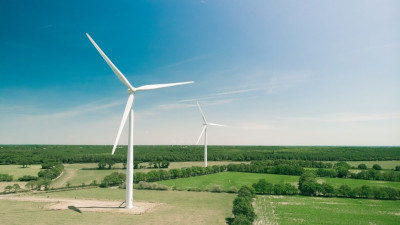 Picture of a wind turbine set in a field