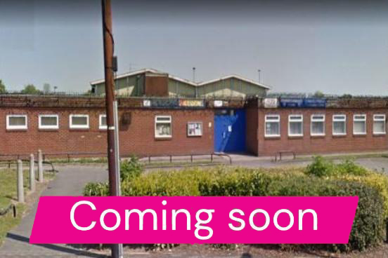 A photograph of the Mitchell community centre with the words coming soon