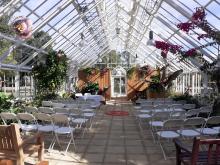 A picture of the inside of Pearson Park Conservatory decorated with flowers