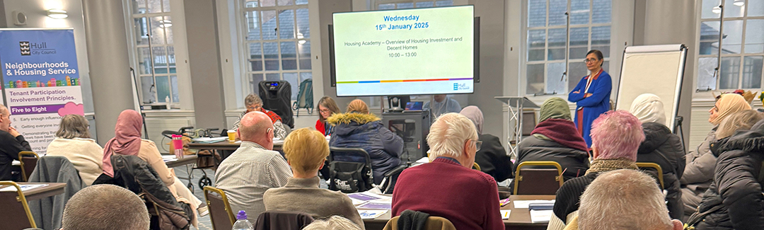 Residents at a tenants meeting