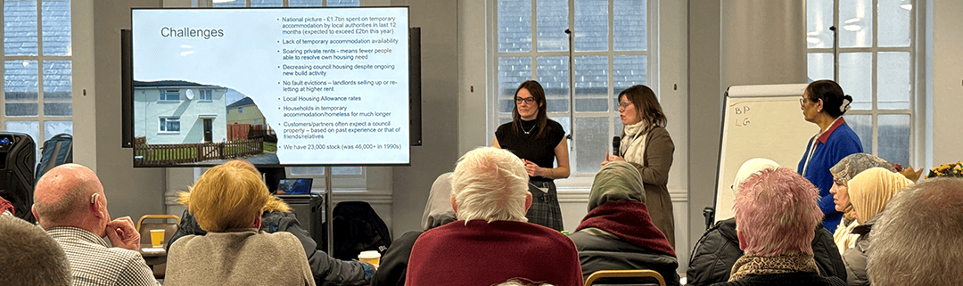 Residents at a tenants meeting