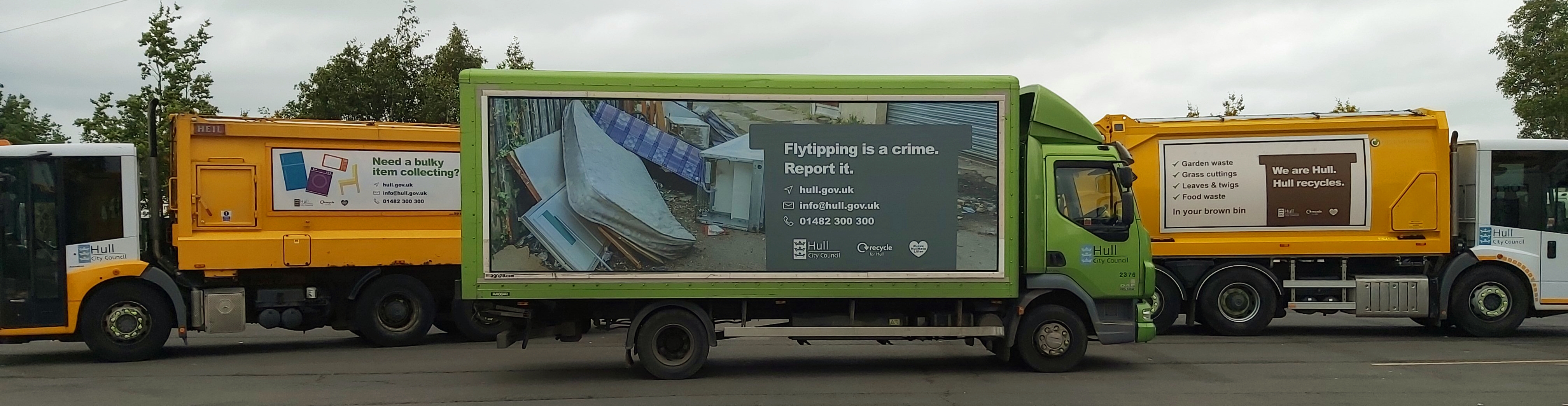 An image of two Bin lorries either side of a van used to collect Bulky Items